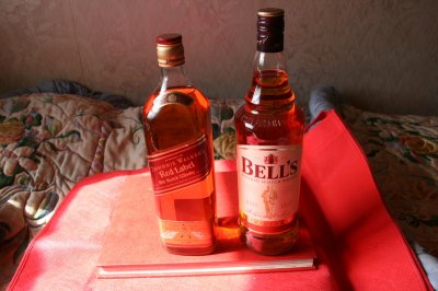 2 Bottles of Scotch Johnnie Walker Red Label 1 Lt. Bells 1 Lt.