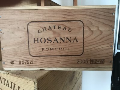 Lot 8:  Chateau Hosanna 2005 (OWC of 6) Pomerol. Recently removed from a country house cellar. Provenance: Wine Society. Perfect appearance. 98/100 RP.