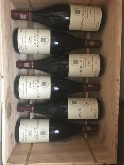 Lot 38:  Chambertin Clos de Beze, Drouhin Laroze 2002 (6 bottles) Excellent levels and appearance. Recently removed from a country house cellar. Provenance: Wine Society.