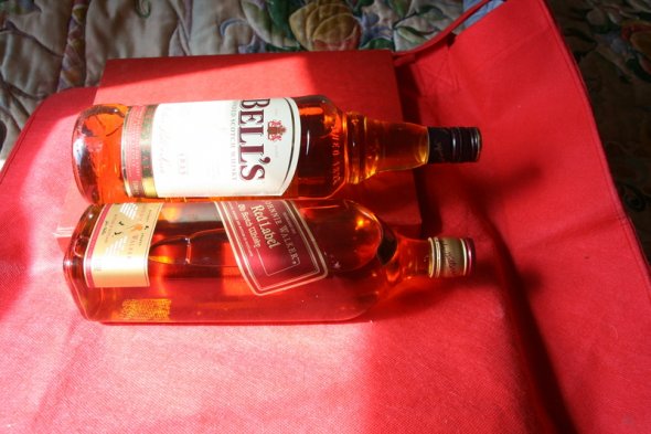 2 Bottles of Scotch Johnnie Walker Red Label 1 Lt. Bells 1 Lt.