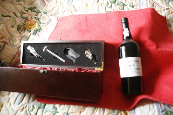 Cockburns 2003 Vintage Port in a wine box with accessories