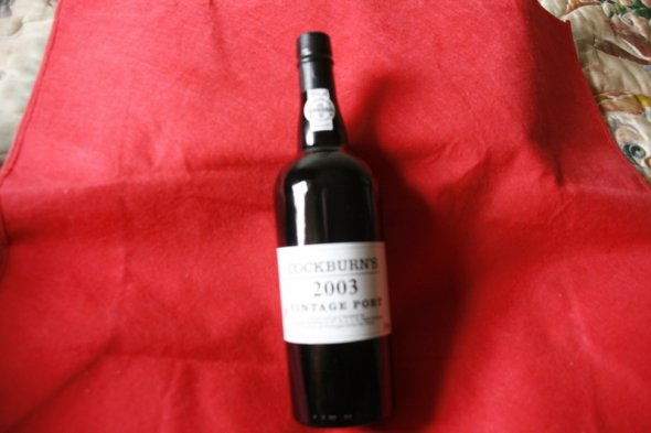 Cockburns 2003 Vintage Port in a wine box with accessories