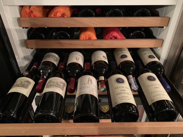 Collections of 21 bottles including Petrus, Mouton Rothschild, Lafite, Latour, Cheval Blanc, Margaux, Sassicaia, Biondi-Santi