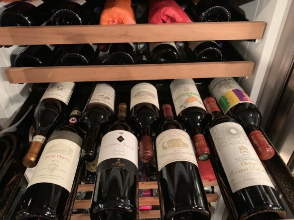 Collections of 21 bottles including Petrus, Mouton Rothschild, Lafite, Latour, Cheval Blanc, Margaux, Sassicaia, Biondi-Santi